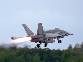 An RCAF CF-18 takes off from CFB Bagotville, Que.