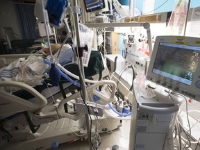 A COVID-19 patient o a ventilator in a Vancouver hospital.