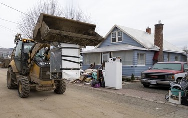 CP-Web. The contents to the insides of homes that were flooded are pictured on the street in downtown Princeton, B.C., Friday, Dec. 3, 2021. Princeton, like many parts of the province, was hit with heavy floods and mudslides over the past couple of weeks causing major devastation.