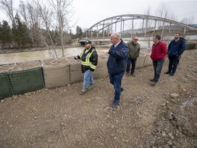Acting Deputy Premier and Public Safety Minister Mike Farnworth and Princeton Mayor Spencer Coyne tour Princeton, B.C., Friday, Dec. 3, 2021. Princeton, like many parts of the province, was hit with heavy floods and mudslides over the past couple of weeks causing major devastation.