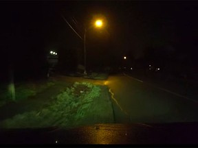 A still from dash-cam video shows a driver veering off the road during a drunk ride through Richmond, Vancouver and Burnaby on Jan. 8, 2021.