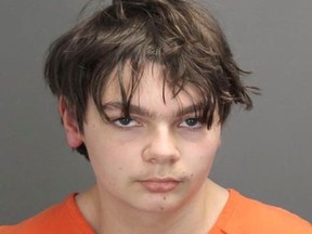 Ethan Crumbley, 15, charged with first-degree murder in a high school shooting, poses in a jail booking photograph taken at the Oakland County Jail in Pontiac, Michigan, U.S. December 1, 2021.