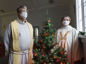 Reverend Helen Dunn and Arch Deacon Stephen Muir at St. Agnes’ Anglican Church in North Vancouver following Christmas mass on Saturday, Dec. 25, 2021. Photo: Jason Payne