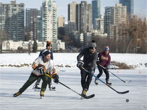 Skaters play a pickup game of shinny during the winter conditions at Vanier Park in Vancouver on Tuesday.


(Photo by Jason Payne/ PNG)

(For story by Gord McIntyre) ORG XMIT: skating [PNG Merlin Archive]
