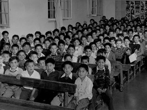Update handout photo of students in assembly hall of the Alberni Indian Residential School. Undated, handout from IRSSS ( Indian Residential School Survivors Society ).