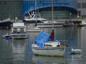 Boats moored in False Creek in Vancouver, Dec. 13, 2021.