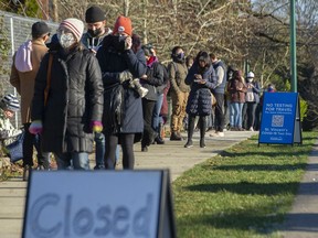 People were waiting up to four hours on Monday at the St. Vincent's COVID-19 testing centre in Vancouver.