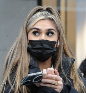 Boxing Day shopper Sama Salehi on Robson Street Sunday.