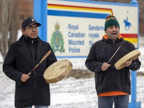 A small group  protested out front the Regina RCMP headquarters as part of the Emergency Solidarity Action with Wet'suwet'en Nation Land Defenders.