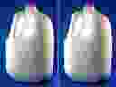 Illustration of milk containers.