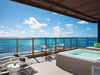 The Preferred Club master suite offers a hottub on a huge deck overlooking the Caribbean ocean.