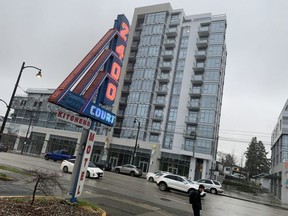 The new Kingsway meets the old: a new highrise has been built across the street from the 2400 Motel, an old-school auto court built in 1946. The 2400 Motel is now owned by the City of Vancouver.