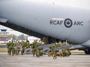 Members of the Canadian Armed Forces arrive in Abbotsford to assist in flood relief.