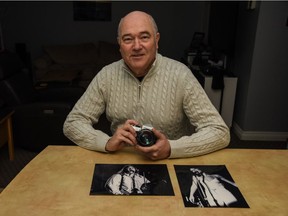 Doug Bower with photos he shot at the 1978 Meat Loaf concert in Vancouver.