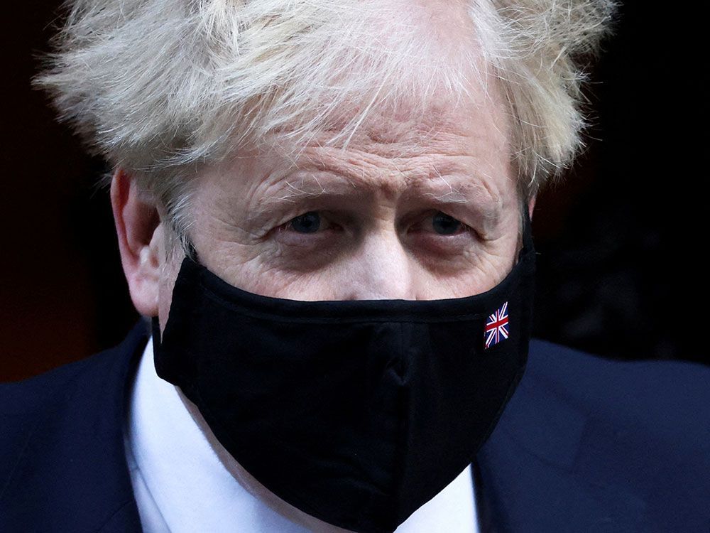 British Prime Minister Boris Johnson, seen in London on Jan. 12, 2022, is facing calls from both within and outside his party to step down over boozy staff parties held during the pandemic at 10 Downing Street.