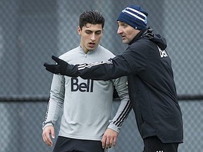 Vancouver Whitecaps coach Vanni Sartini gives Gianfranco (Frankie) Facchineri some instruction at the University of B.C.