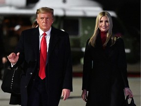 In this photo taken on January 04, 2021 US President Donald Trump and daughter Senior Advisor Ivanka Trump make their way to board Air Force One before departing from Dobbins Air Reserve Base in Marietta, Georgia.