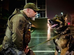 Police service dog Garner with his handler Const. Chris Cottrill of the Delta Police Department on their final shift together Jan. 11, 2022.