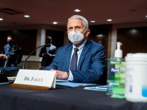 Dr. Anthony Fauci, director of the National Institute of Allergy and Infectious Diseases, prepares to testify before a U.S. congressional committee in Washington, D.C., last week. Fauci’s prognosis that coronavirus is likely to be with us indefinitely isn’t meant to scare us, but prepare us.