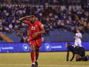 Canada's Jonathan David celebrates scoring his side's second goal against Honduras in their 2-0 victory in a FIFA World Cup men's qualifying soccer match in San Pedro Sula, Honduras, on Thursday.