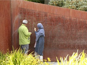 Charges have been approved an arrest warrant issued for a suspect who defaced Vancouver's Komagata Maru memorial last summer. The graffiti can be seen in this file photo from August 2021.