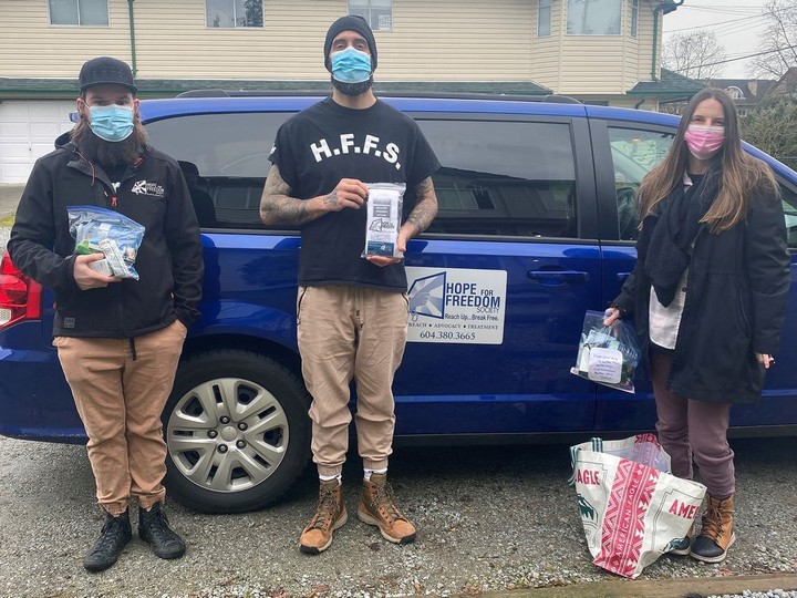  Hope for Freedom volunteers Travis Z, Adam T and Amanda F prepare to deliver supplies to homeless people in the Tri-Cities.