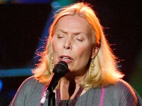 Canadian singer Joni Mitchell performs during a concert in Los Angeles, November 14, 2002.