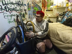 Fawn Auger, a resident of the Patricia Hotel in Vancouver, packs her belongings Friday, January 21, 2022 after being given an eviction notice.