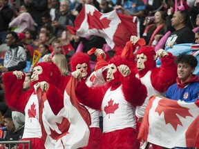 Fans react as Canada plays Fiji at B.C. Place Stadium during the 2019 HSBC Canada Sevens rugby tournament in Vancouver on March 9, 2019.