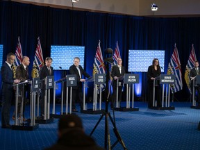 (From left) Val Litwin, Ellis Ross, Michael Lee, Stan Sipos, Kevin Falcon, Renee Merrifield, and Gavin Dew at the B.C. Liberal leadership debate on Dec 14.