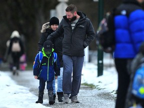 Students return to Sir John Franklin Elementary in East Vancouver following a week-long delay in scheduled classes after the Christmas holidays.