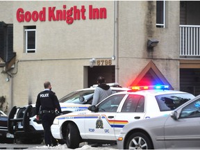 Police at the scene of Good Knight Inn in the 5700-block of 200 Street in Langley on Tuesday morning.