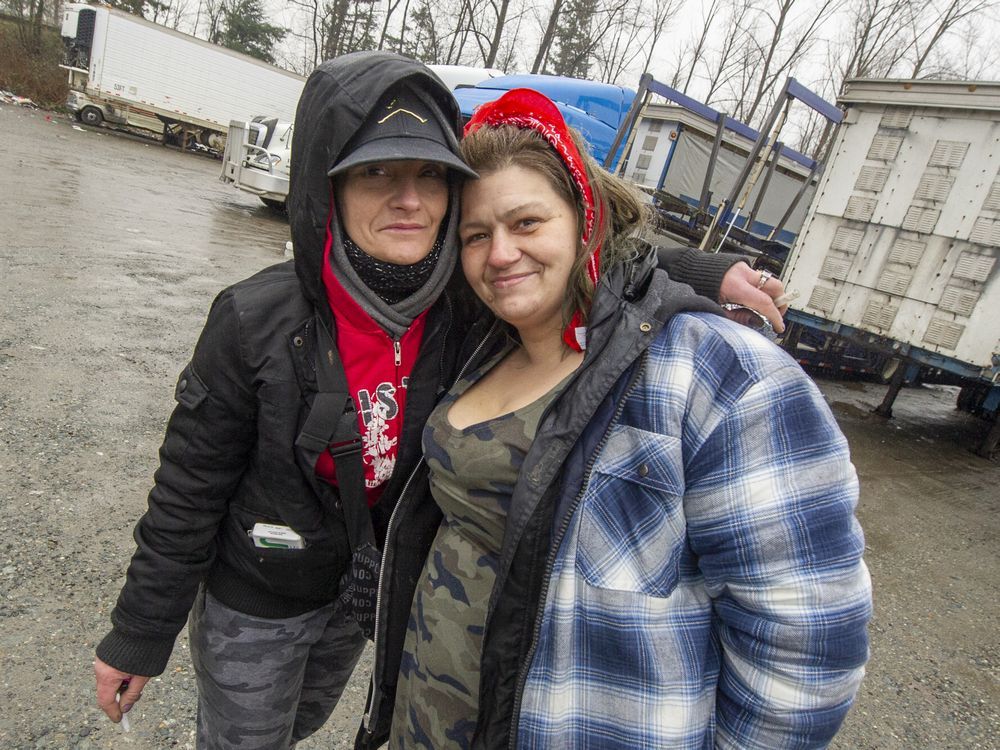  Sarah Nelson (left) and Angel Massey support each other while being homeless.