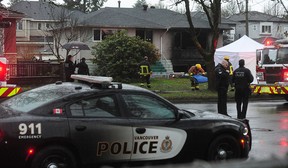 Vancouver firefighters and police are on the scene at a house on 41st Avenue on Earles Street Sunday morning. Three people died and two were taken to hospital.