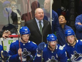 New Vancouver Canucks head coach Bruce Boudreau in his debut behind the bench on Dec. 6, 2021, against the Los Angeles Kings at Rogers Arena.