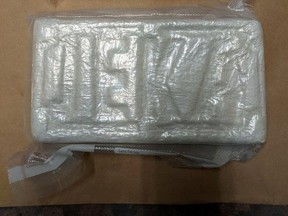 Items seized in an investigation into an alleged organized drug trafficking network with ties to members of the Hells Angels Motorcycle Club.