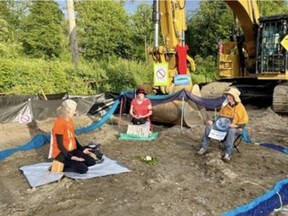 Prayer Circle Peaceful Direct Action with (from left) Ruth Walmsley, Dr. Christine Thuring, Catherine Hembling.