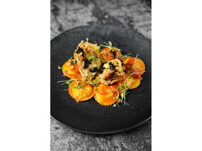 Land & Sea proves to be popular in restaurant hungry Kerrisdale 9 Chili crab dish.