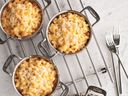 A comforting Mac and Cheese casserole is topped with Parmesan for kids of all ages.