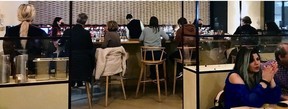 Customers at the bar at Zarak.