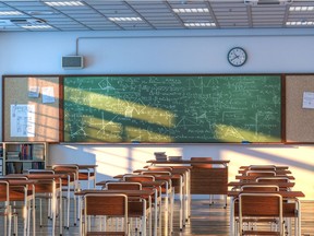 Feb. 16, 2022 - interior of a school classroom with wooden desks and chairs. - stock photo