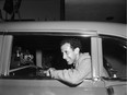 John Landy leaves Vancouver airport in 1954.