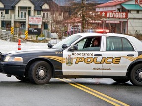 Abbotsford police enforce the evacuation order that remains in most of the flooded Sumas Prairie on Nov. 24, 2021. Exact location not provided. City of Abbotsford [PNG Merlin Archive]