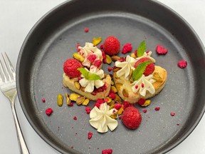 White chocolate brownie with pistachios and raspberries created by the team at Five Sails.
