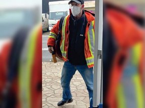Police are searching for this man after a person walked into a Burnaby business and bear sprayed two workers on Jan. 24, 2022.