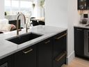 Kalu Interiors expanded and remodeled this Gastown condo kitchen.