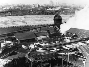 A sawmill at Granville Island photo of Granville Island. This 1917 photograph shows the beginning of dredging in False Creek and the Granville Bridge, Yaletown and Downtown in the background Photo credit: City of Vancouver Archives
