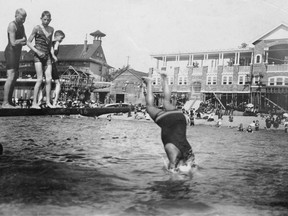 Joe Fortes diving into the water at English Bay, circa 1906. Philip Timms Vancouver Archives AM336-S3-3-: CVA 677-591