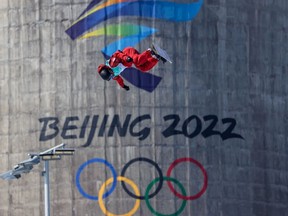 Canada’s Darcy Sharpe competes in the men’s snowboard big air final at the Beijing 2022 Winter Olympics on Tuesday. A new Leger survey shows that, as of last weekend, only 27 per cent of British Columbians who had planned to watch the Games had actually tuned in.
