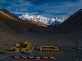 FILE PHOTO: In this aerial photo released by Xinhua News Agency, the Mount Qomolangma, also known as Mount Everest, base camp is seen on May 25, 2020.